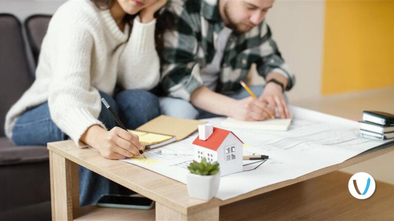 Couple creating a plan for starting their rental property business